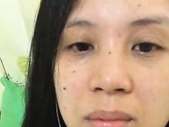 Lusty Asian Bimbo Moans While Rubbing Her Shaved Velvet Pur
